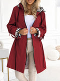Cappotto lungo da donna con cappuccio e zip